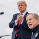 Texas Gov. Greg Abbott speaks alongside former President Donald Trump during a tour to an unfinished section of the border wall on June 30, 2021 in Pharr, Texas.